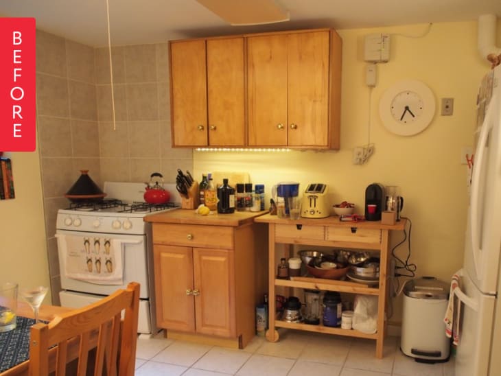 Before: a cluttered kitchen with a rolling cart to extend the countertop
