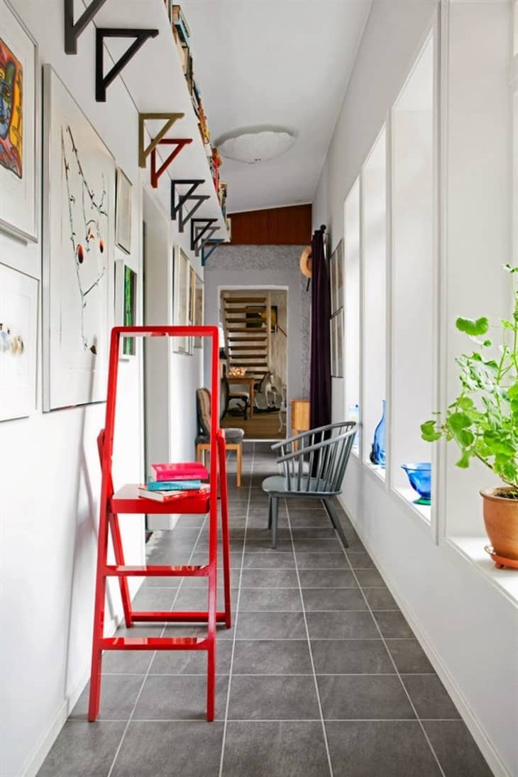 For a narrow hallway you should choose narrow storage solution. You can  cover the whole wall with such st…