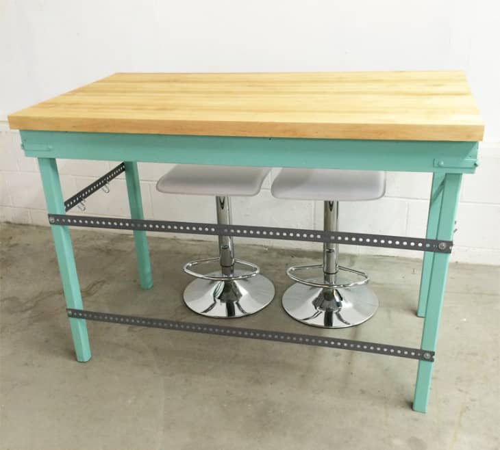 Table with butcher block top made into kitchen island