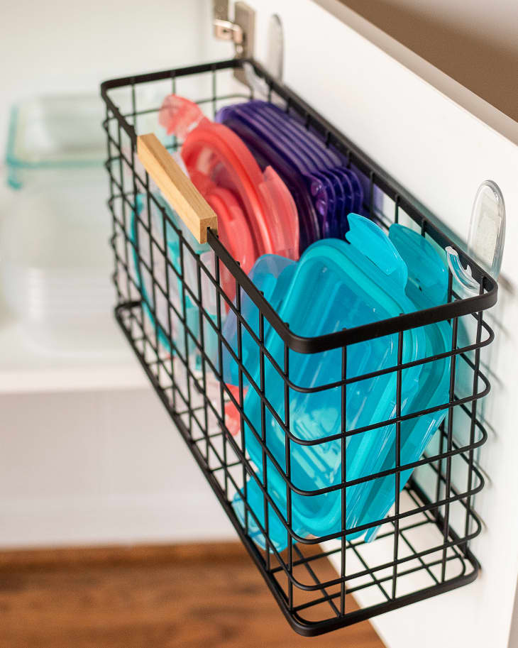 Super simple way to organize Tupperware lids - napkin holders from