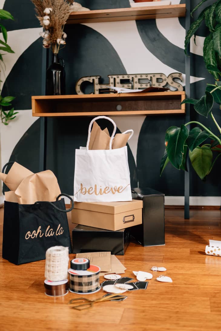 Mix of present wrapping supplies on the floor