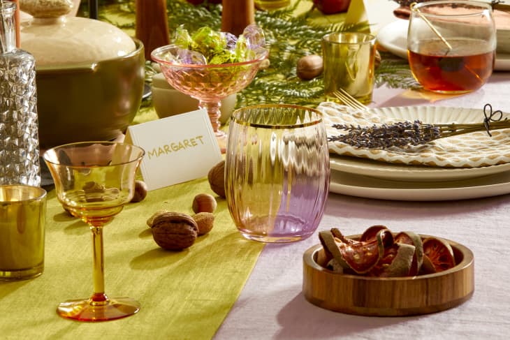 Close up of cocktail glasses on a colorful holiday table scape.