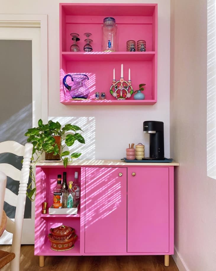 hot pink prep station with hot pink hanging bookcase above