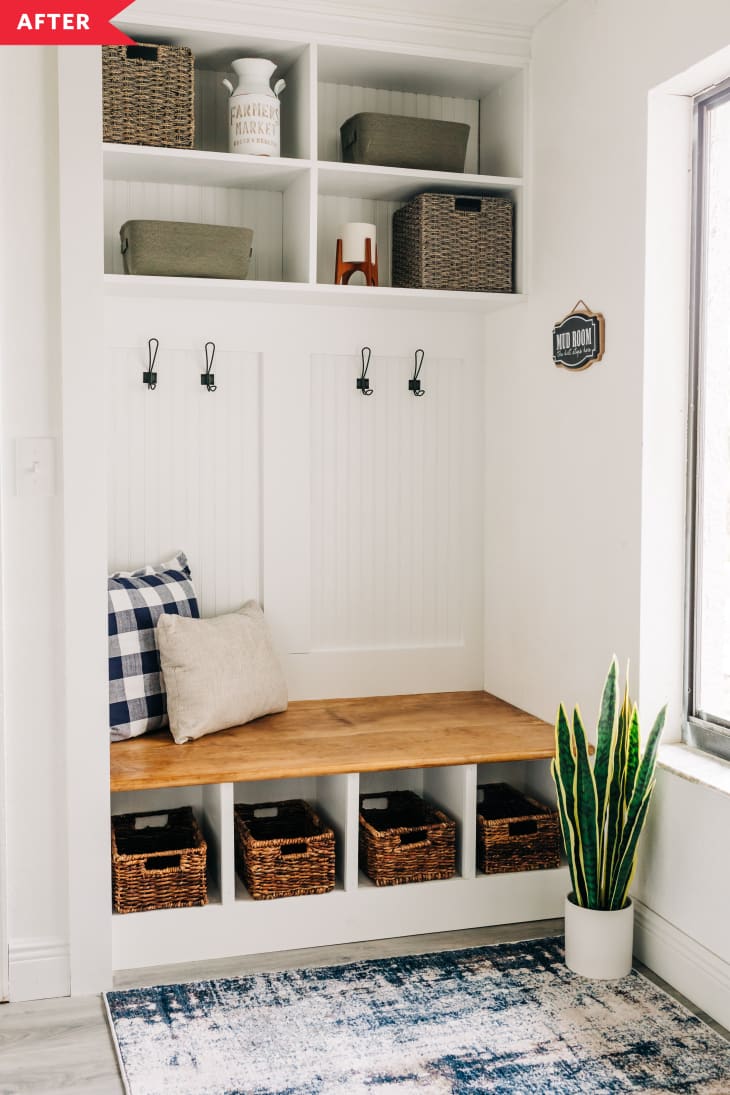 After: White mudroom with built-in bench and cubbies