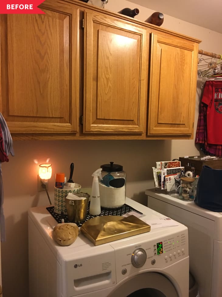 Beige laundry room with light wood cabinets