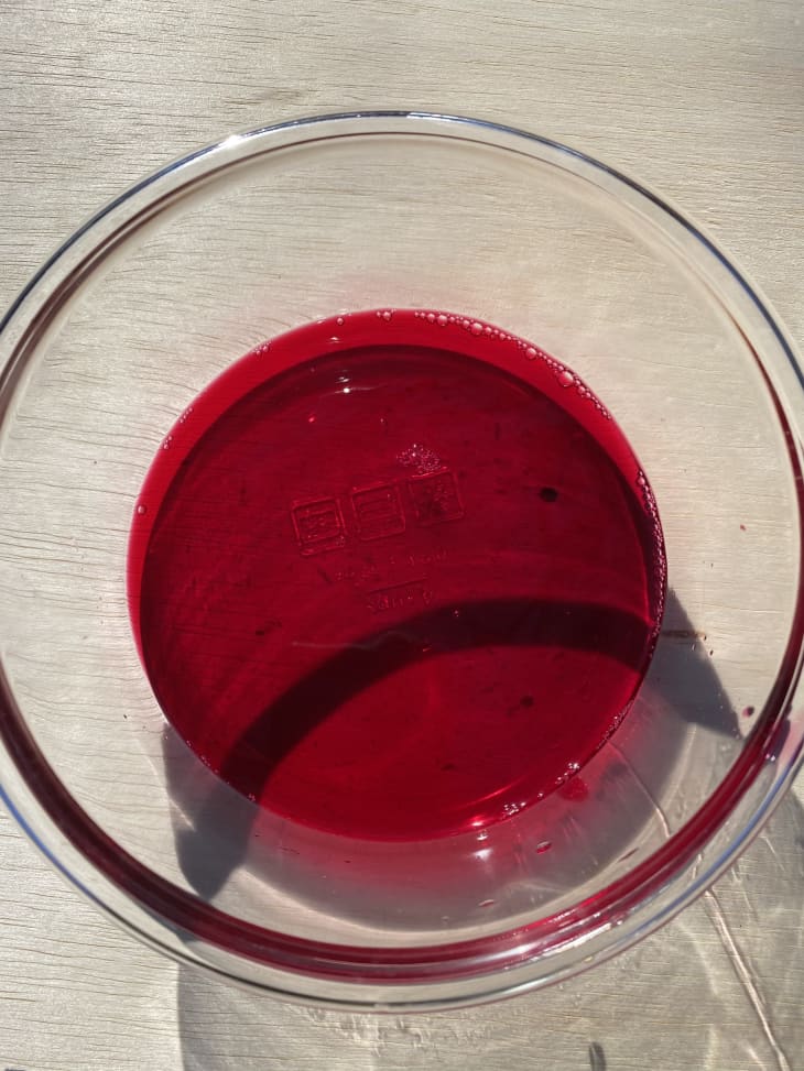 Glass bowl full of red beet juice