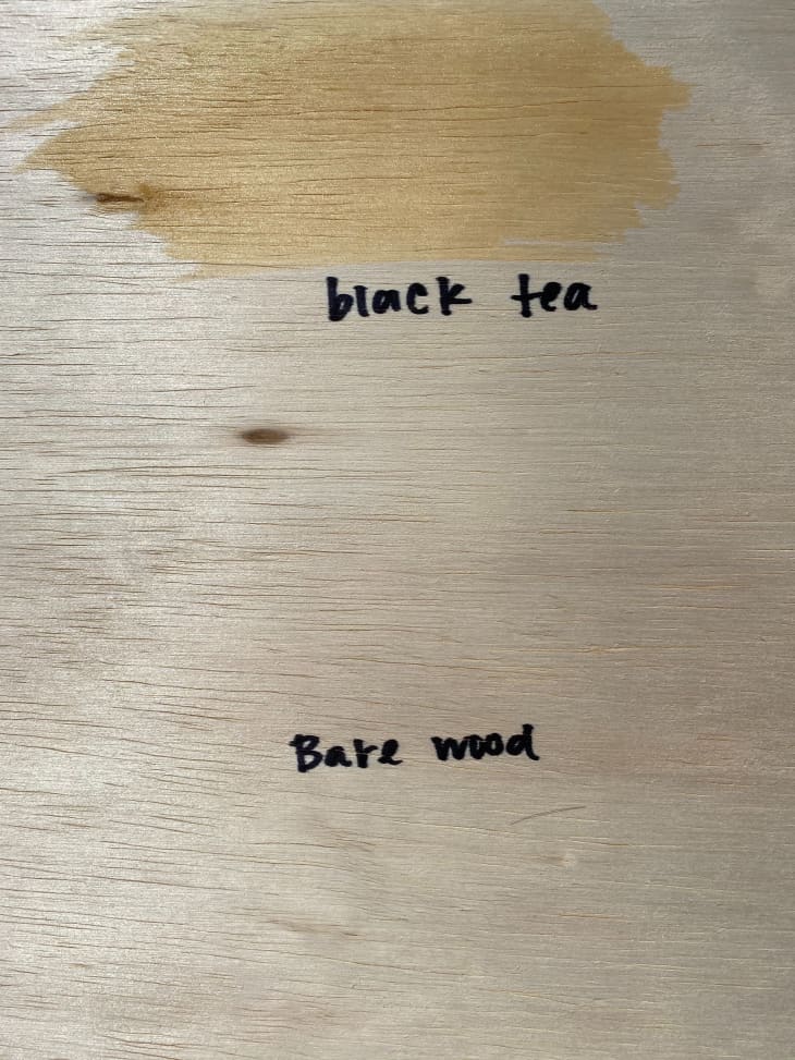 wood panel with black tea stain