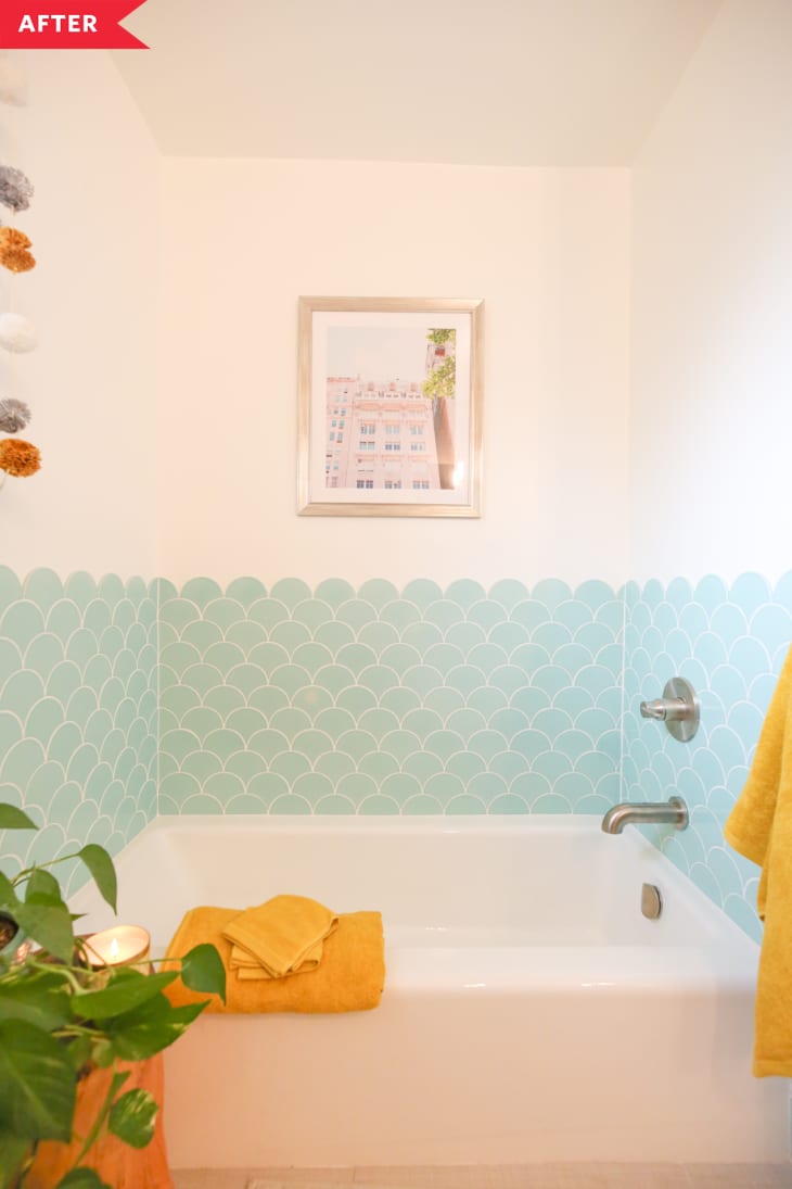 After: Bath tub with light blue scalloped wall tile