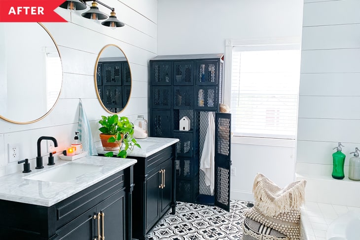 After: Bathroom with a pair of black vanities, round mirrors, a storage locker, and patterned tile floors