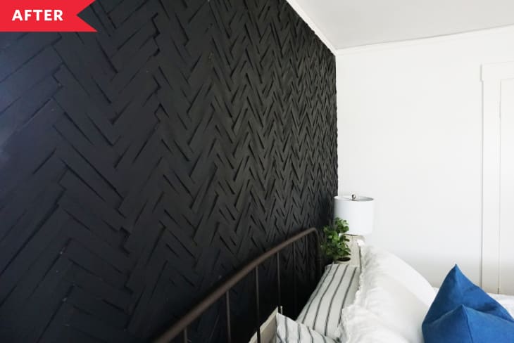 After: Black accent wall with textured chevron pattern