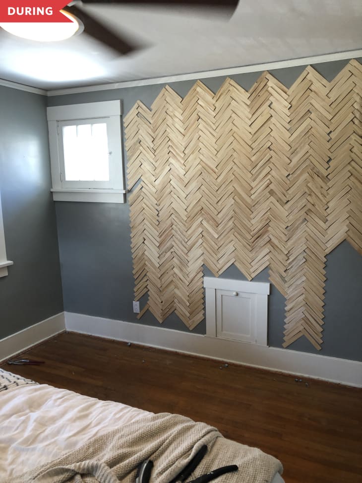 During: Shims in a chevron shape on the gray wall