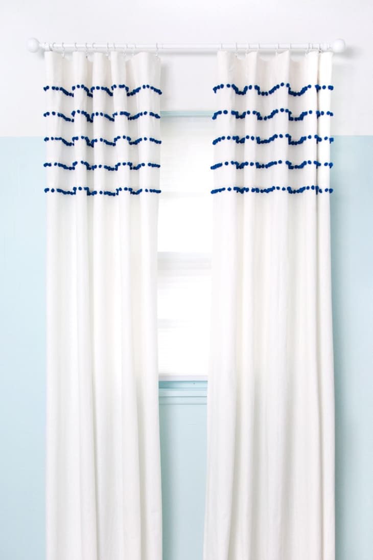 Pom pom-striped white curtains