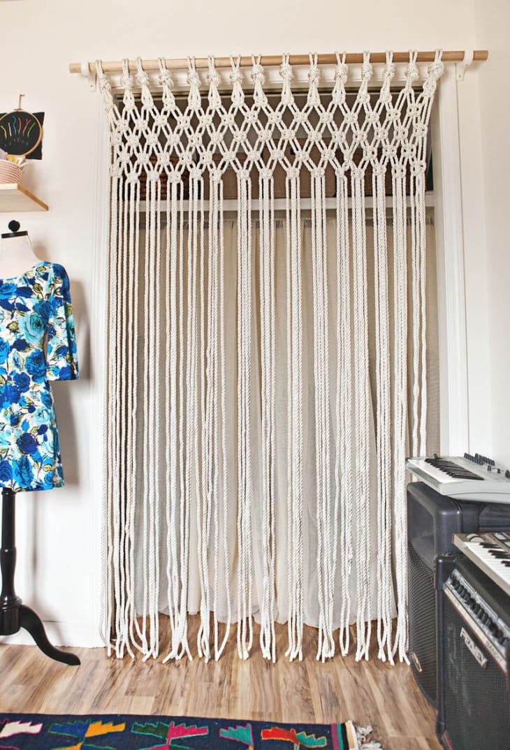 DIY macrame curtain in front of a closet