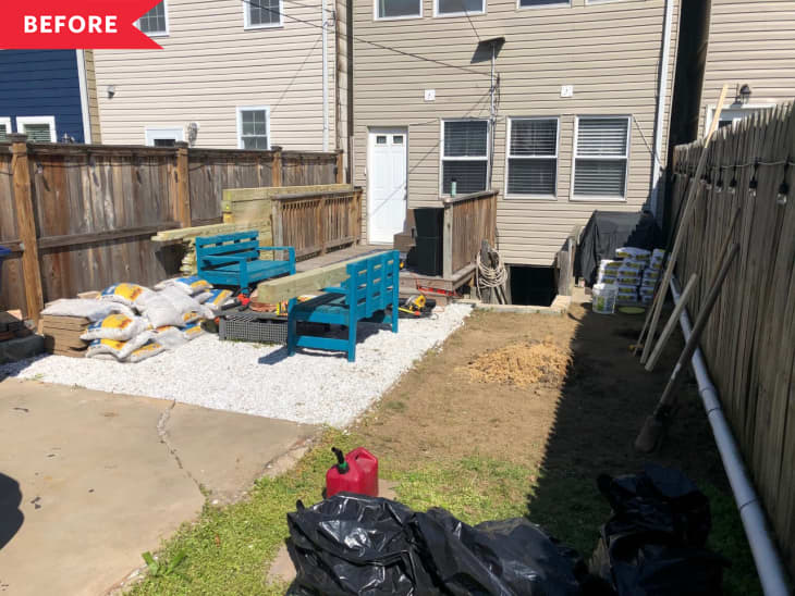 Before: small backyard with limited patio space and two blue benches