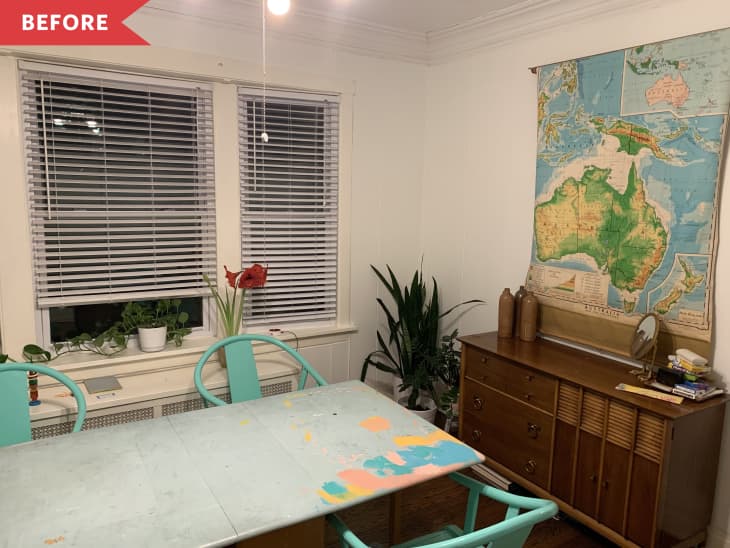 Before: dining room with white walls, wood sideboard, and map on the wall