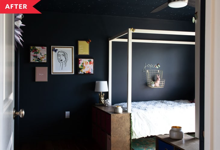 后置:床与黑色墙壁和棕色层压板橱柜