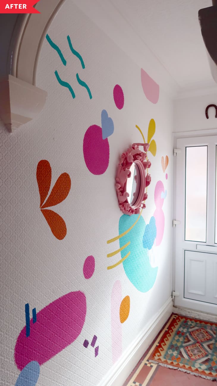 After: White walls with abstract colorful mural