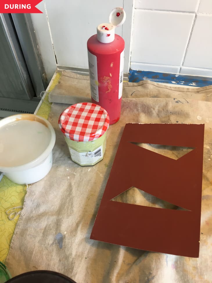During: Paints and cut stencil