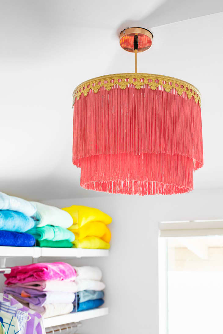 coral-colored fringed pendant light