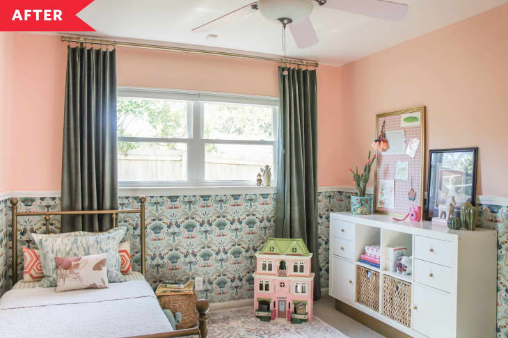 After: Bedroom with pink painted walls and wallpaper, plus gold bed and white dresser