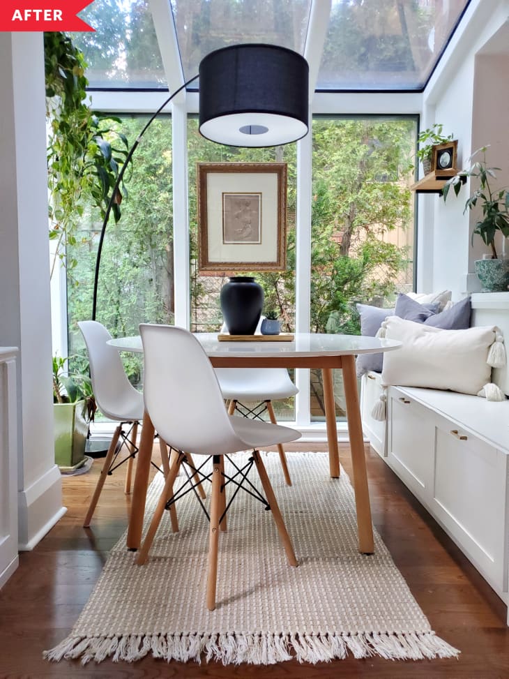 After: breakfast nook with IKEA hacked bench for seating, round table, and three chairs