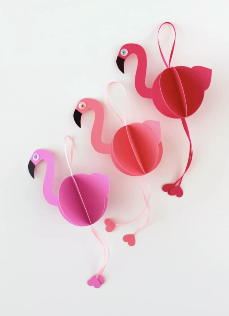 Three pink flamingo ornaments