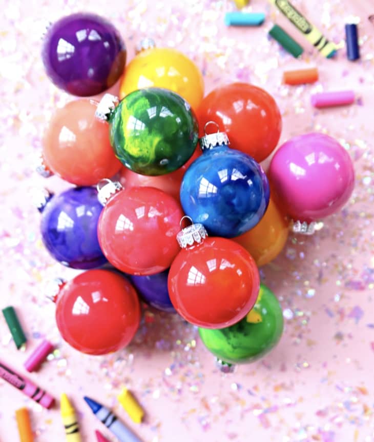 Glass ball ornaments filled with melted crayons