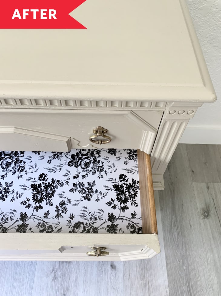 After: Inside of dresser drawer with black and white floral lining