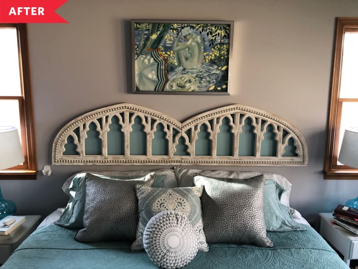 After: King-sized bed with arched wooden wall art used as headboard