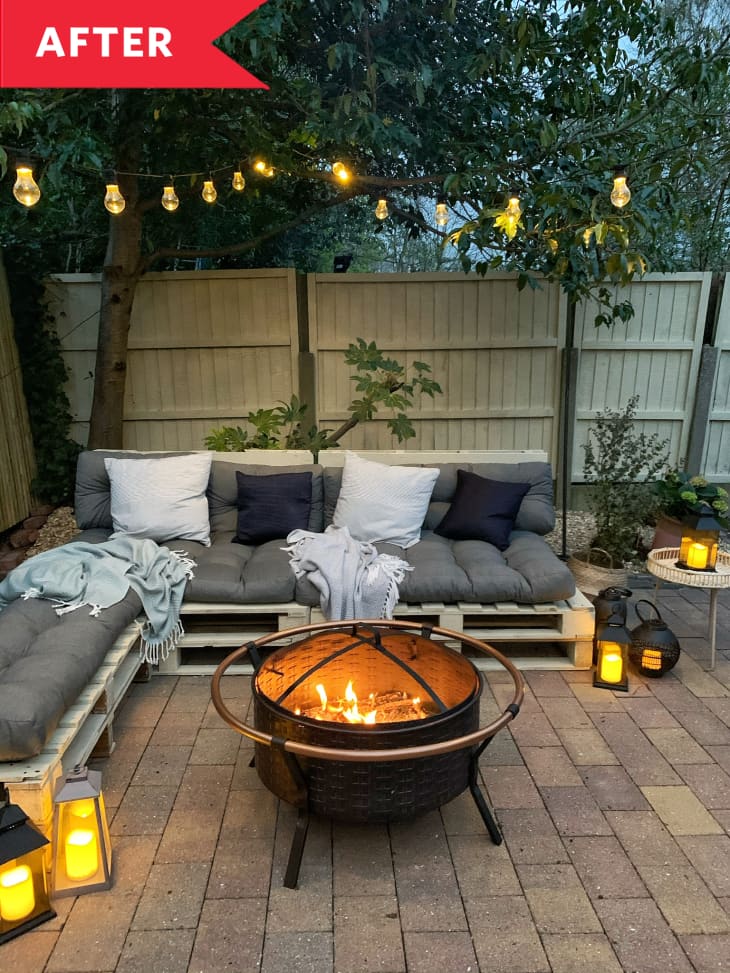 After: Outdoor sectional made of wooden pallets and cushions around fire pit