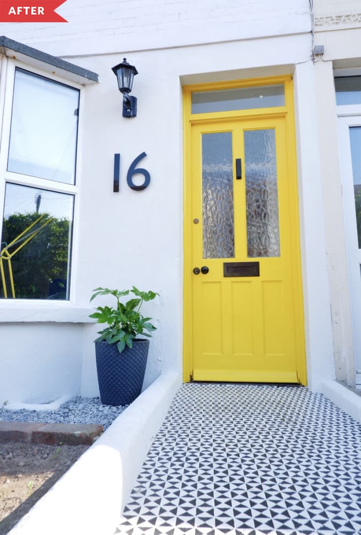After: Yellow door with painted walkway in black and white geometric pattern