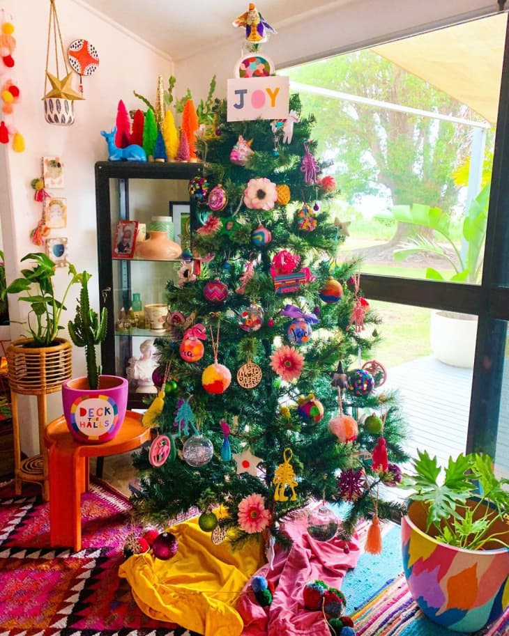 tree decorated with faux flowers