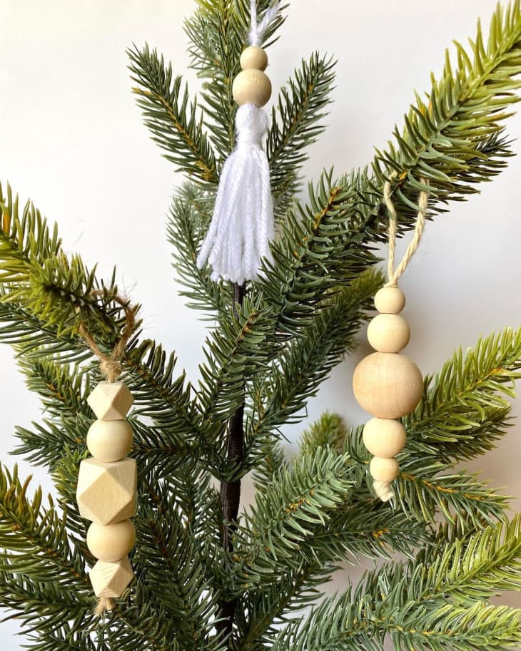 wood bead and tassel ornaments on a Christmas tree