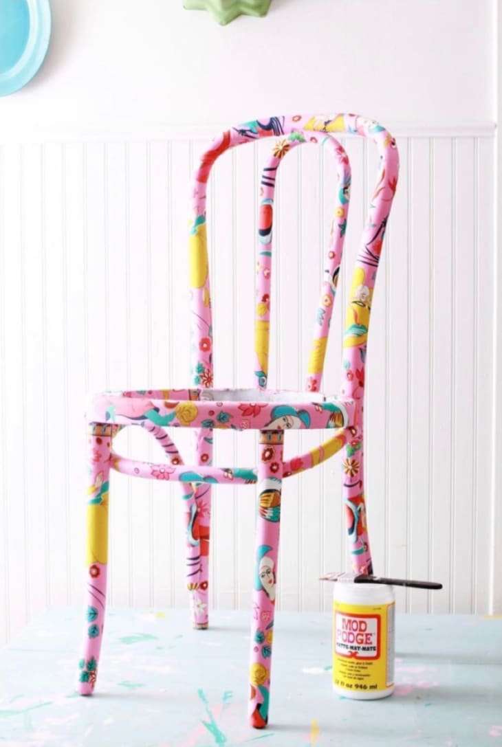 Chair decoupoged with pink and yellow fabric