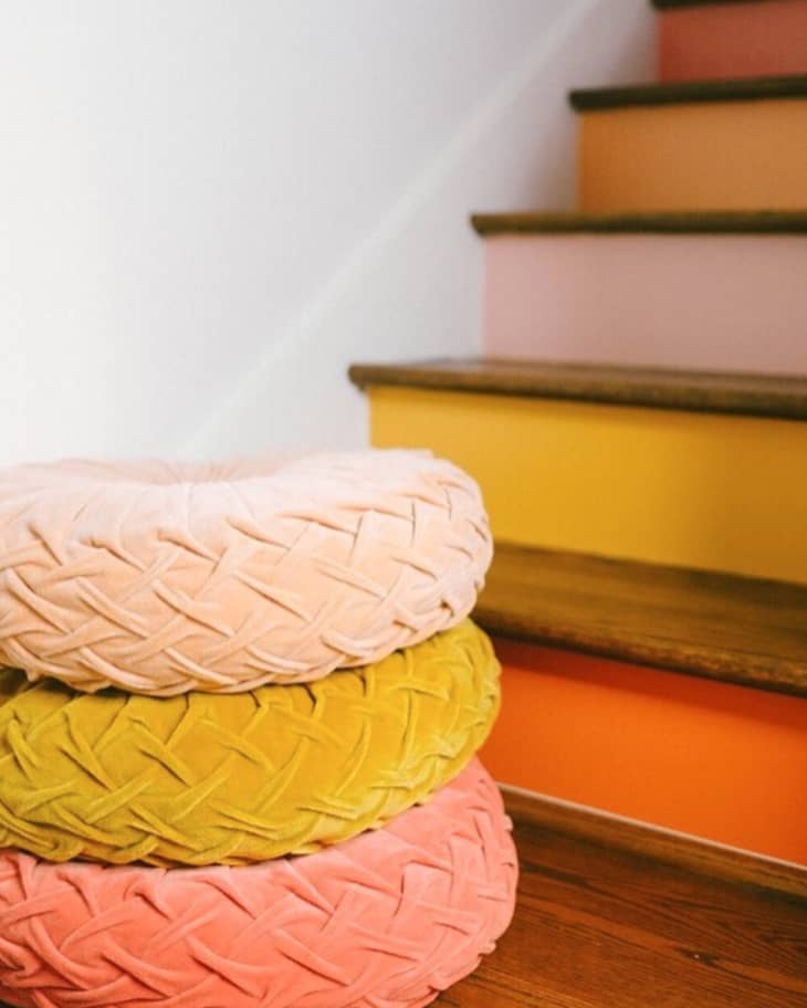 Orange, gold, and ballet pink cushions and stairsteps