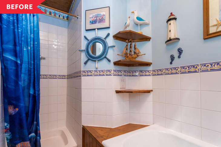 Before: Bathroom with natural wood vanity, blue walls, and nautical decor