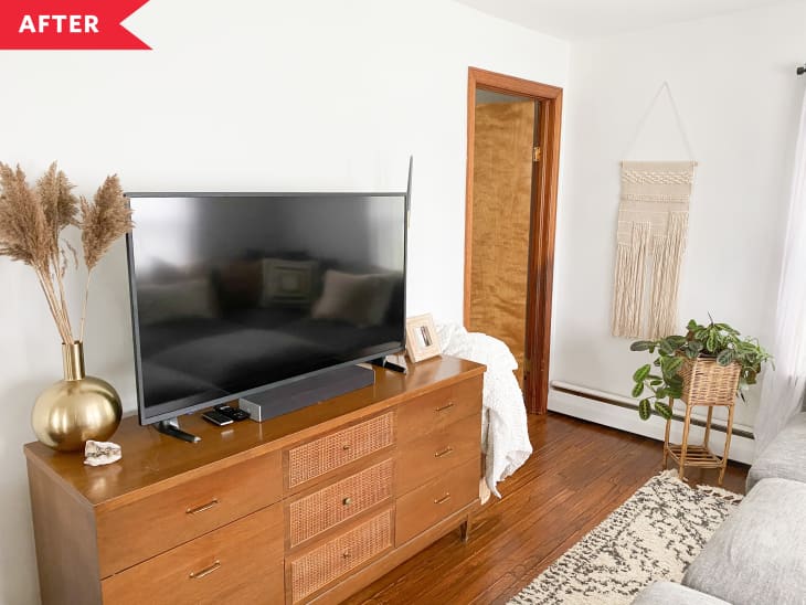 After: living room with wood dresser as TV stand