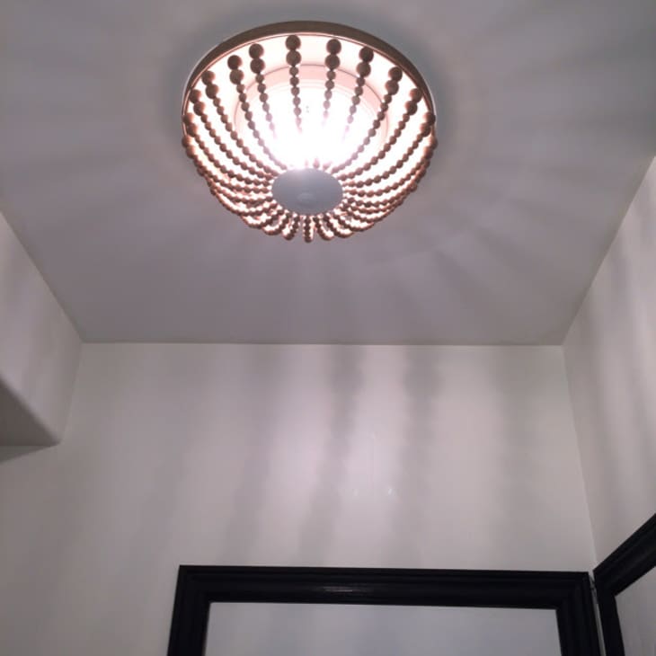 Bead light covering over ceiling fixture