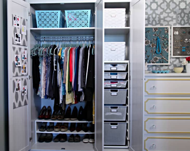 organized armoire closet with custom drawers