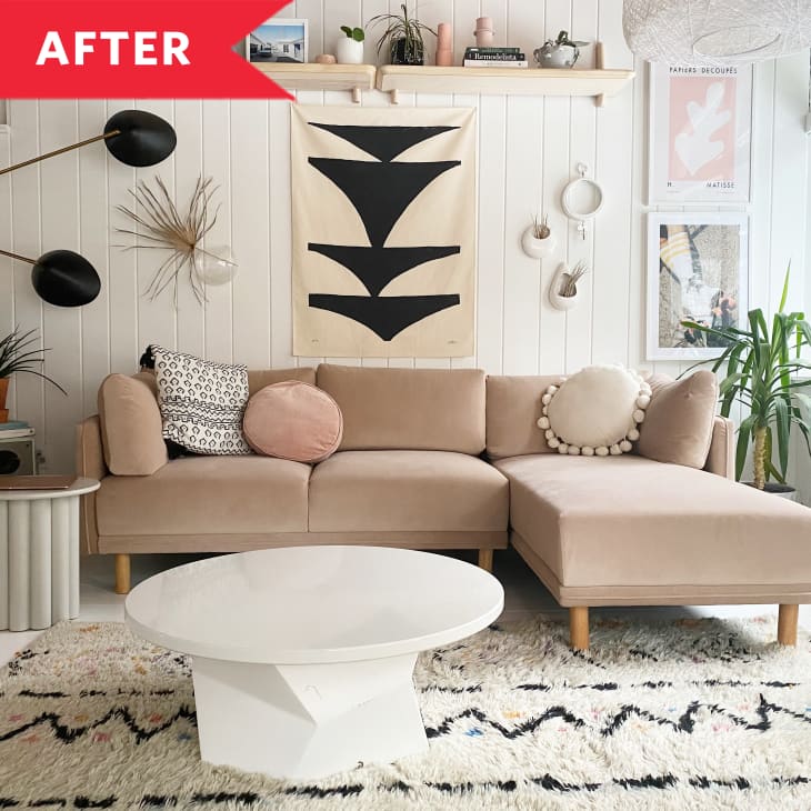 After: Light pink sofa in room with black and white decor