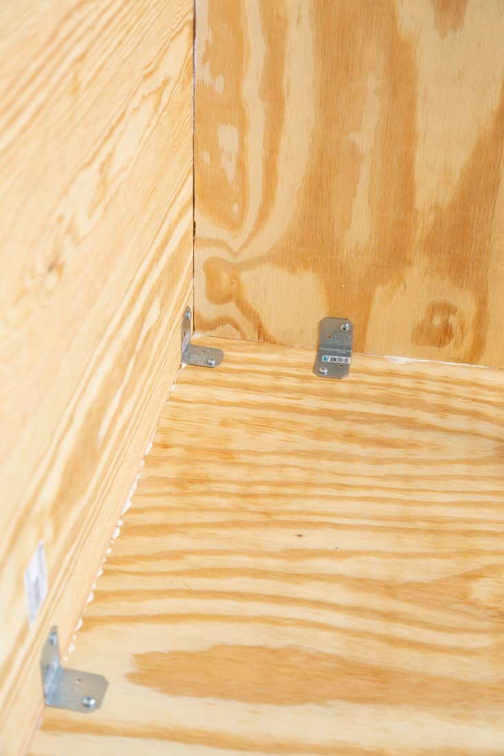 Interior of wooden box with brackets