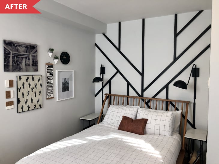 After: White bedroom with black geometric accent wall and wood spindle bed