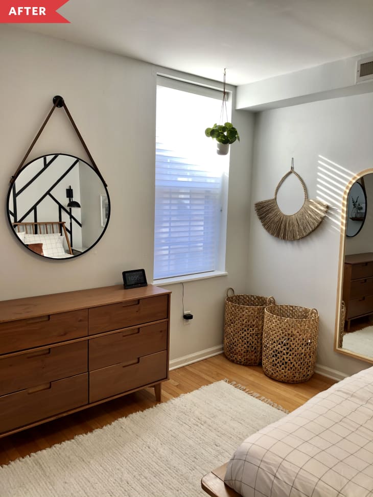 After: White bedroom with wood furniture and mid-century inspired mirrors