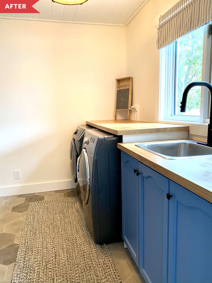 After: Laundry room with medium blue cabinets and wood countertop