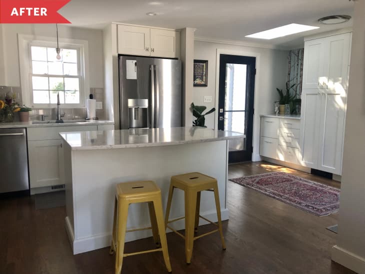 After: Bright, open kitchen with island and yellow barstools