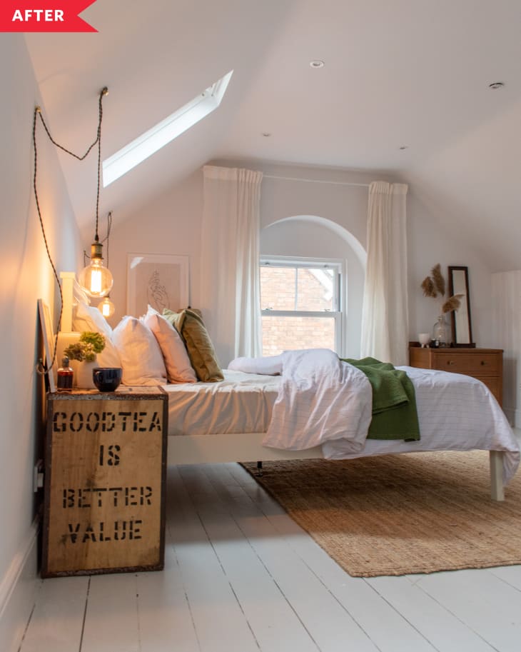 After: Attic bedroom with white walls, white floors, and vintage-style furnishings