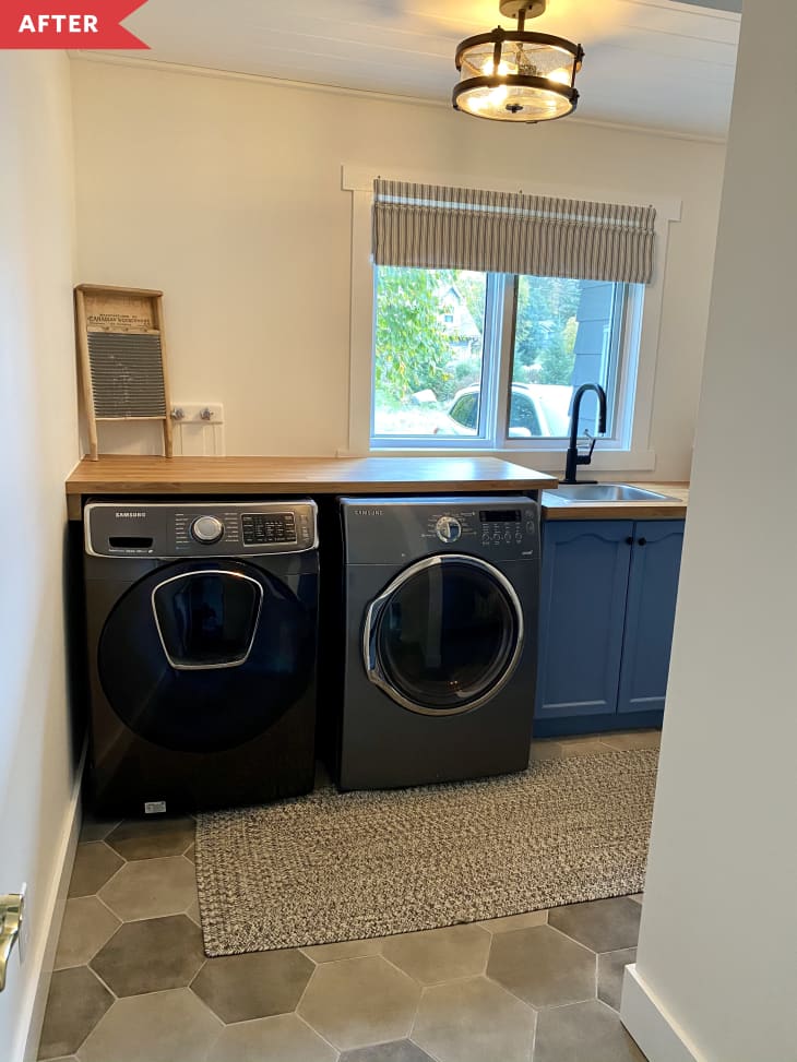 After: Laundry room with blue cabinets and wood counters