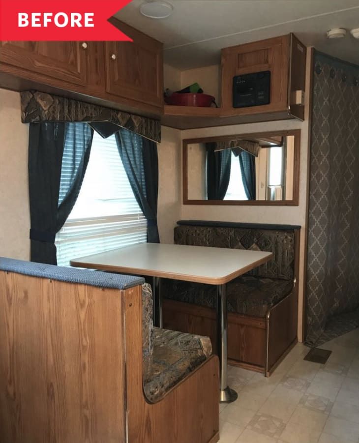 Before: Wooden dining booths and table in dated RV seating area