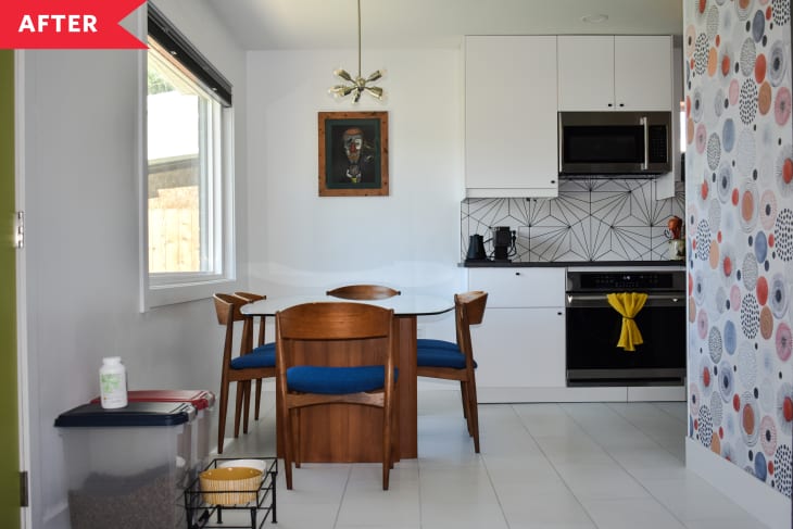 After: White kitchen with mid-century-inspired wallpaper, porcelain floors, and graphic backsplash