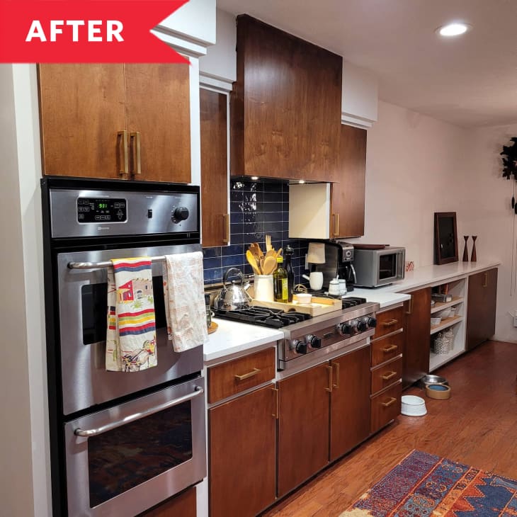 After: Double oven to the left of stovetop and sleek brown cabinetry in kitchen